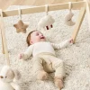 Arche en bois avec jouets à suspendre teddy bouclette