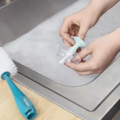 Goupillon pour biberon avec ventouse bleu
