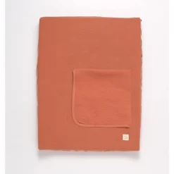 Matelas à langer avec housse et serviette uni terracotta