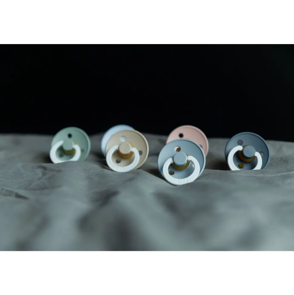 Pack de 2 sucettes colour caoutchouc phosphorescente 0-6 mois petrol et deep space