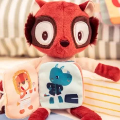 Peluche phosphorescente avec livre en tissu elvis
