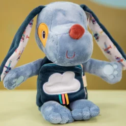 Peluche phosphorescente avec livre en tissu jules