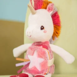 Peluche phosphorescente avec livre en tissu lena