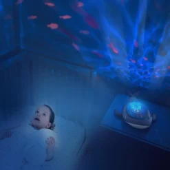 Peluche veilleuse bébé projection effets aquatiques baleine aqua dream