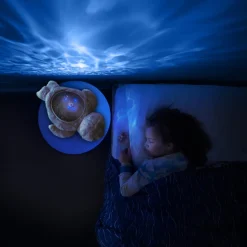 Peluche veilleuse bébé projection phoque aqua dream