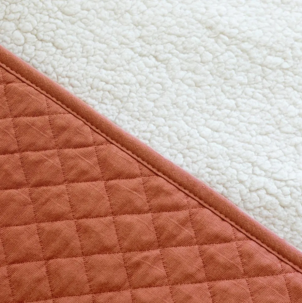 Poncho chaud de voyage pady quilted brick