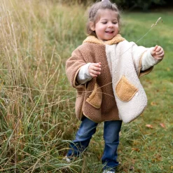 Poncho chaud de voyage teddy bouclette muffin