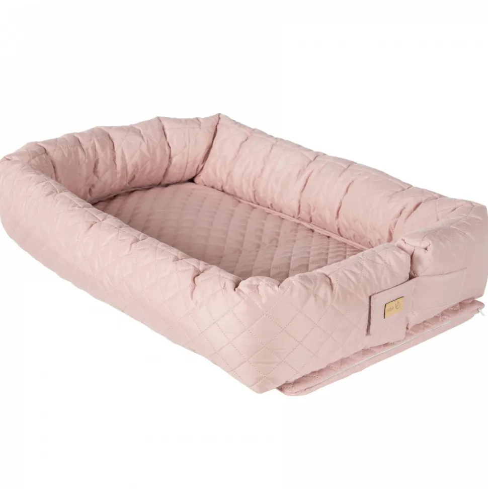 Réducteur de lit bébé rose
