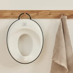 Réducteur de toilette blanc et noir