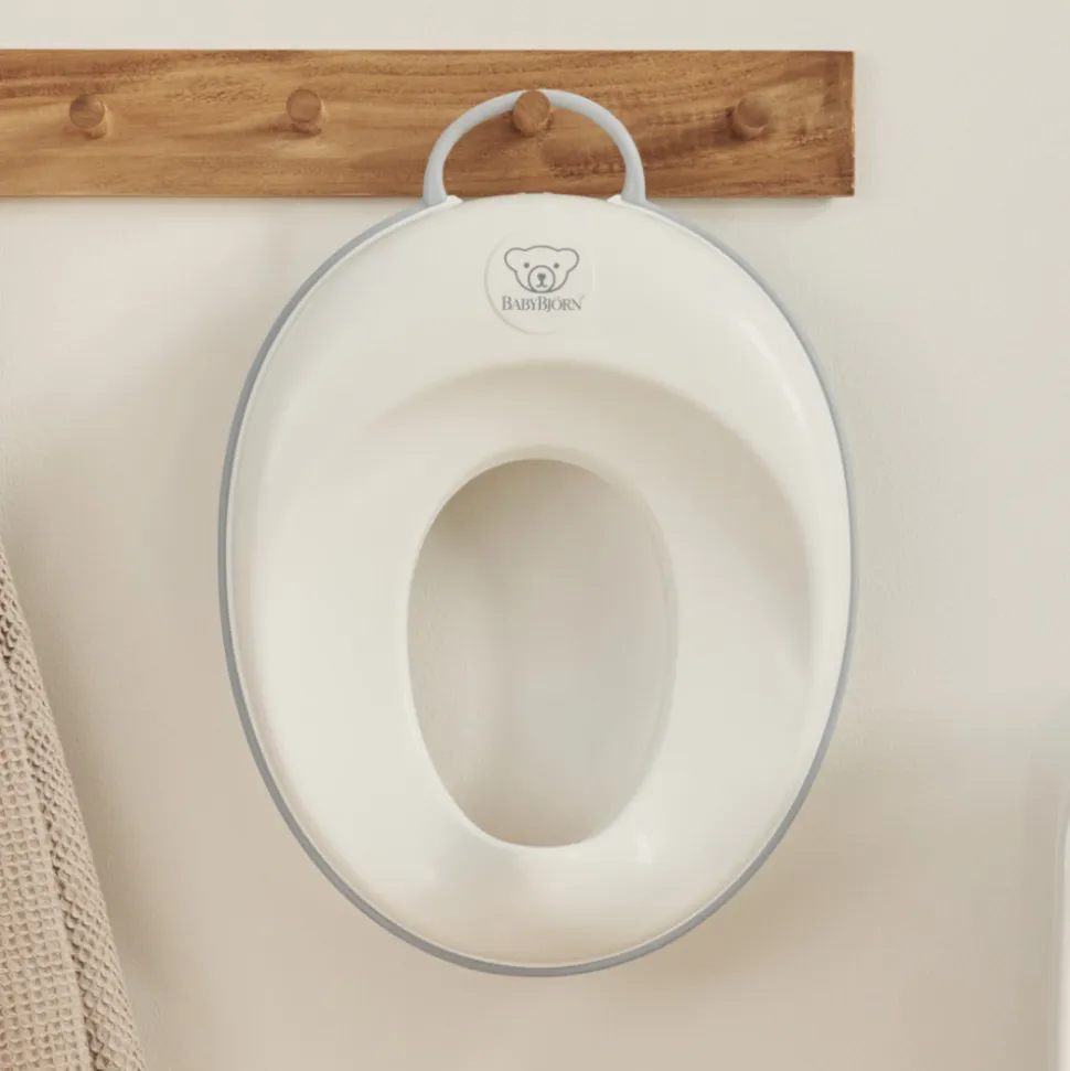 Réducteur de toilette blanc et gris