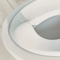 Réducteur de toilette blanc et gris