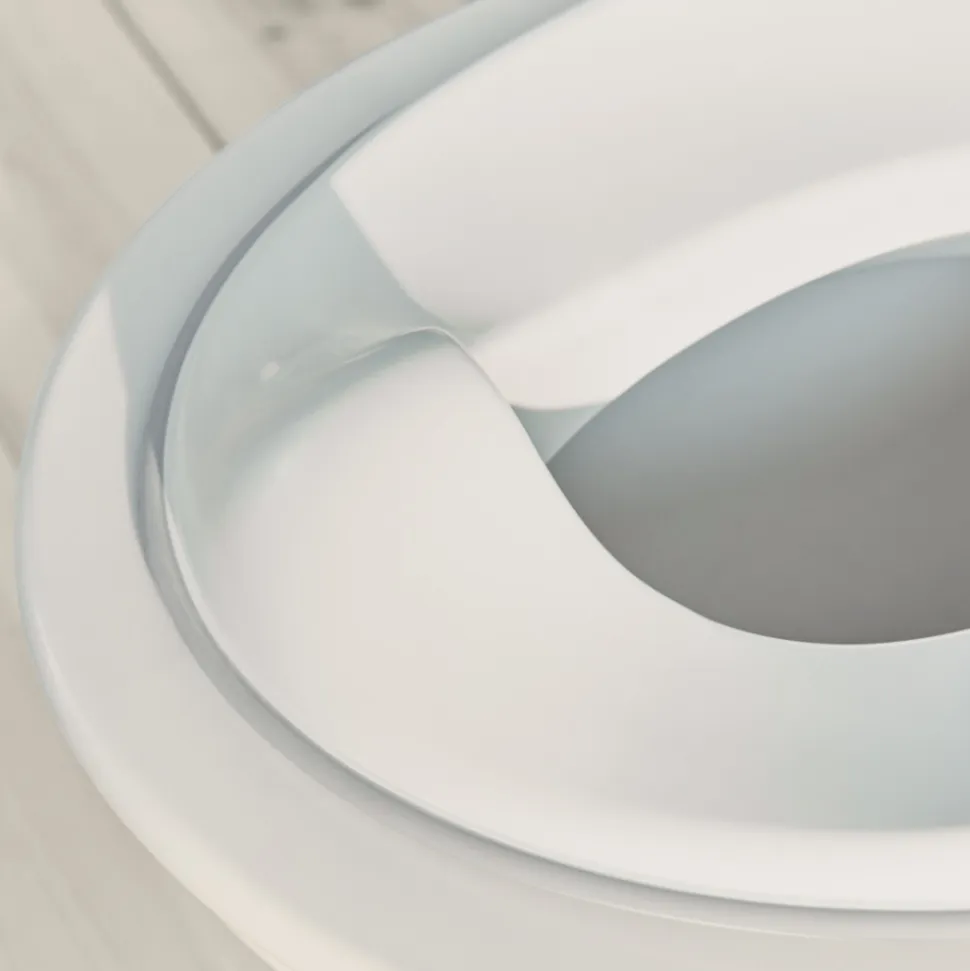 Réducteur de toilette blanc et gris