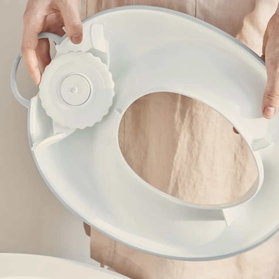 Réducteur de toilette blanc et gris
