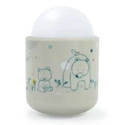 Veilleuse bébé nomade beige dans les bois