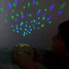 Veilleuse projecteur d’étoiles enfant dinosaures